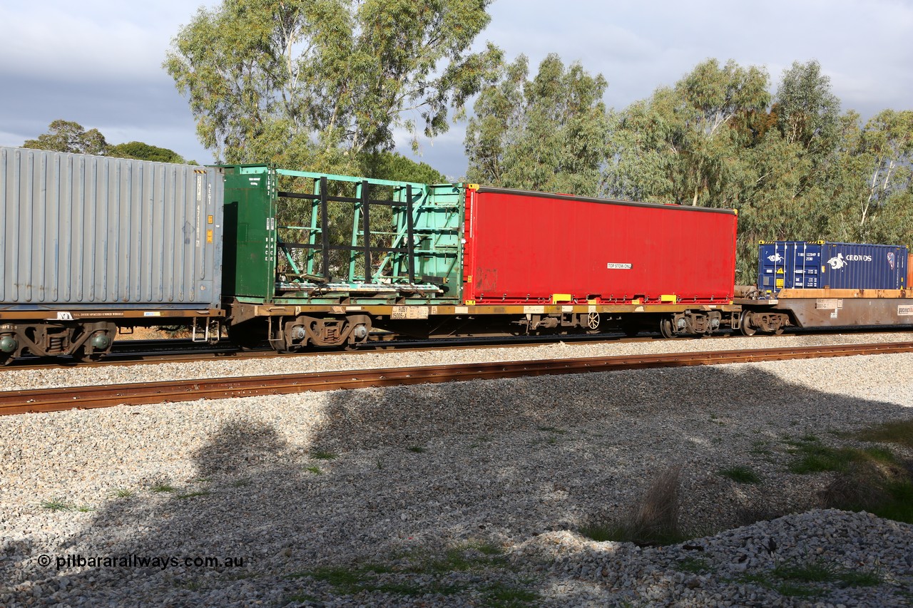 160609 0412
Woodbridge, 5PM5 intermodal train, RQBY 15005, one of seventy that Comeng NSW built as OCY type container flat waggon in 1974-75, recoded to NQOY, then NQSY and NQBY.
Keywords: RQBY-type;RQBY15005;Comeng-NSW;OCY-type;