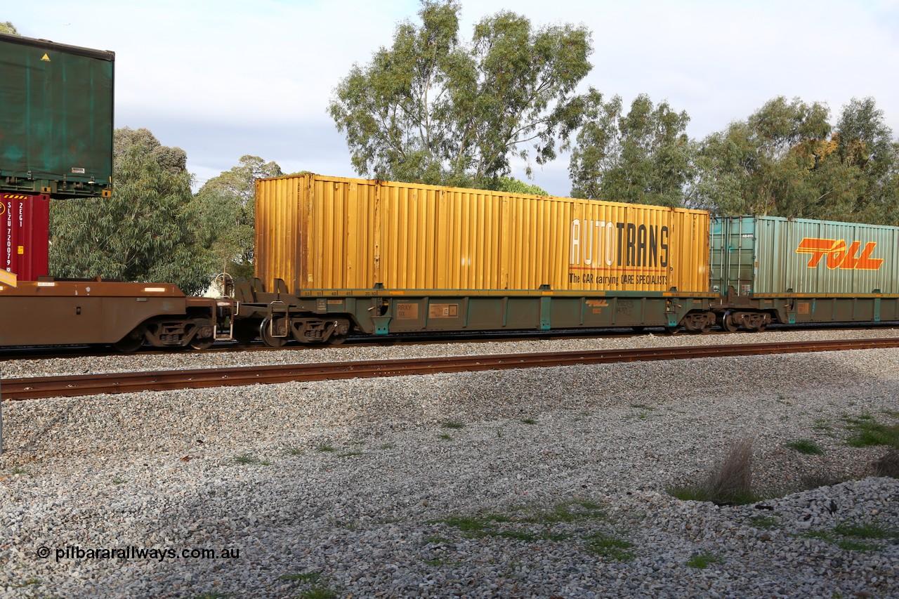 160609 0421
Woodbridge, 5PM5 intermodal train, RRXY 9 platform 5 of 5-pack well waggon set, one of eleven built by Bradken Qld in 2002 for Toll from a Williams-Worley design with a 53' AutoTrans automobile box AB 035.
Keywords: RRXY-type;RRXY9;Williams-Worley;Bradken-Rail-Qld;