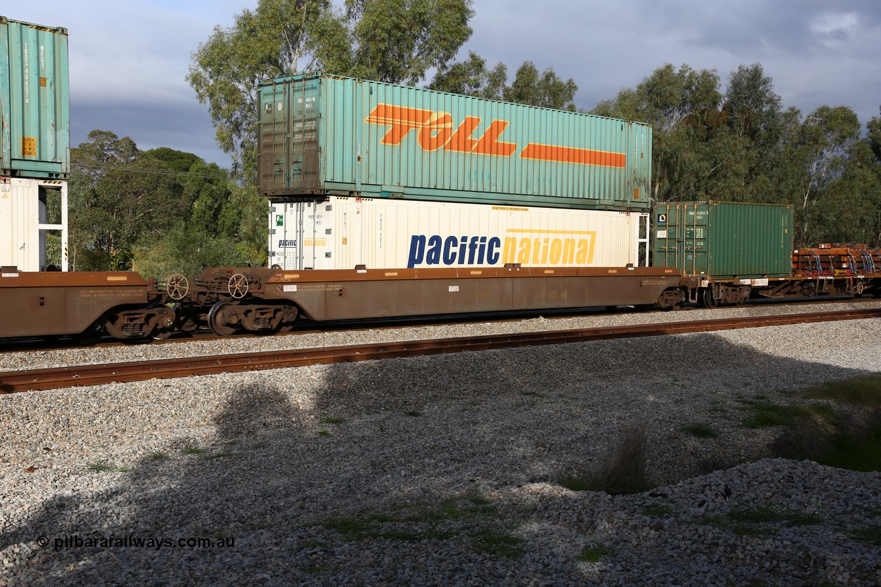 160609 0454
Woodbridge, 5PM5 intermodal train, platform 5 of 5-pack RRRY 7011 well waggon set, one of nineteen built in China at Zhuzhou Rolling Stock Works for Goninan in 2005, 46' Pacific National reefer PNXR 4859 and Toll 48' box TDDS 486148 on top.
Keywords: RRRY-type;RRRY7011;CSR-Zhuzhou-Rolling-Stock-Works-China;