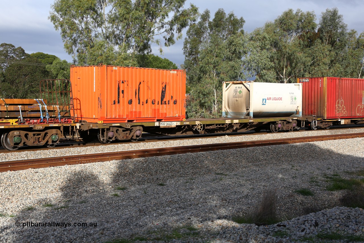 160609 0456
Woodbridge, 5PM5 intermodal train, RQGY 34425 container waggon built by Tulloch Ltd NSW in 1974/75 as type OCY, then NQOY. FCL 20' orange box FCBU 963215 and an Air Liquide 20' tanktainer IS 16-8.
Keywords: RQGY-type;RQGY34425;Tulloch-Ltd-NSW;OCY-type;NQOY-type;