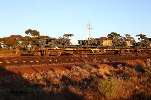160522 2039
Parkeston, 5MP2 steel train, view from rear looking at NQOY 15056 and RQCY 701 loaded with bogies for Trans-Perth B set 116. NQOY type waggon built by Comeng NSW in batch of seventy OCY type container waggons in 1974/75. Recoded to NQOY in 1979-80.
Keywords: NQOY-type;NQOY15056;Comeng-NSW;OCY-type;RQCY-type;RQCY701;