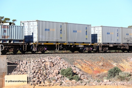 160522 2061
Binduli, 5MP2 steel train, NQYY 20897 container waggon, originally built by EPT NSW in 1980-81 as an BDY / NODY open waggon before being heavily modified with a pair of Royal Wolf 20' 22G1 type containers with Pacific National decals, RWLU 815065 and RWLU 815037.
Keywords: NQYY-type;NQYY20897;EPT-NSW;BDY-type;NODY-type;