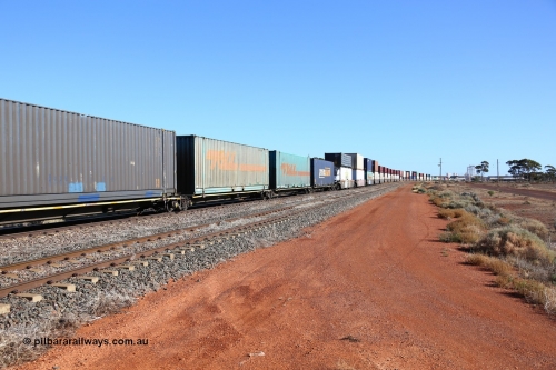 160522 2114
Parkeston, 6MP4 intermodal train, 5-pack low profile skel waggon set RRYY 52, the last of 52 such waggons built by Bradken at Braemar NSW in 2004-05, loaded with 48' containers and a wall of double stacks.
Keywords: RRYY-type;RRYY52;Williams-Worley;Bradken-NSW;