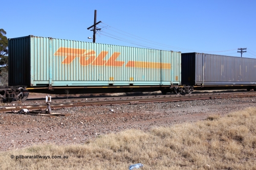 160522 2161
Parkeston, 6MP4 intermodal train, platform 3 of 5-pack low profile skel waggon set RRYY 17, one of fifty two such waggon sets built by Bradken at Braemar NSW in 2004-05, loaded with Toll 48' container TCML 48544.
Keywords: RRYY-type;RRYY17;Williams-Worley;Bradken-NSW;