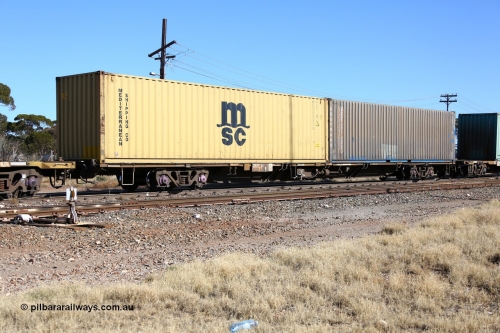 160522 2166
Parkeston, 6MP4 intermodal train, RQJW 22002 jumbo container waggon, on of thirty two built by Comeng NSW in 1973-75 as the JCW type, recoded to NQTW then NQGW, with an Austrans 40' 4EG1 type AUSU 405026[0] and Mediterranean Shipping Co 40' 45G1 box MEDU 848937[5].
Keywords: RQJW-type;RQJW22002;Comeng-NSW;JCW-type;NQJW-type;NQTW-type;NQWW-type;