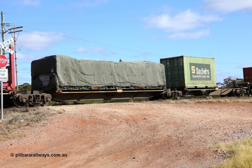 160522 2344
Parkeston, 7MP7 priority service train, platform 2 of 5-pack articulated skel waggon set, Qiqihar Rollingstock Works China built RRQY 5816, 40' KTI 102 flatrack with tarped load.
Keywords: RRQY-type;RRQY8516;Qiqihar-Rollingstock-Works-China;