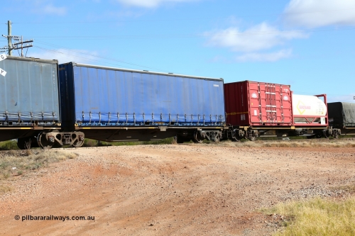 160522 2348
Parkeston, 7MP7 priority service train, RRAY 7190 platform 1 of 5-pack articulated skel waggon set, 1 of 100 built by ABB Engineering NSW 1996-2000, 40' curtainsider RWTU 903058[9] with no logo.
Keywords: RRAY-type;RRAY7190;ABB-Engineering-NSW;