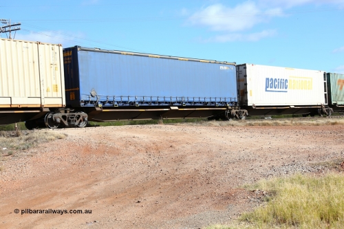 160522 2376
Parkeston, 7MP7 priority service train, RQQY 7077 platform 3 of 5-pack articulated skel waggon set, 1 of 17 built by Qld Rail at Ipswich Workshops in 1995, Pacific National 48' MFG4 type curtainsider PNXC 5635.
Keywords: RQQY-type;RQQY7077;Qld-Rail-Ipswich-WS;