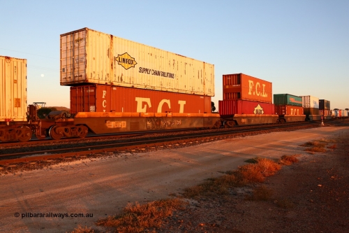 160523 2733
Parkeston, 1PM5 intermodal train, RRZY 7039 one of thirty two 5-pack well waggon sets built by Goninan in 1995-96 for National Rail as the RQZY type, recoded when repaired, with a mix of containers of type and length.
Keywords: RRZY-type;RRZY7039;Goninan-NSW;RQZY-type;