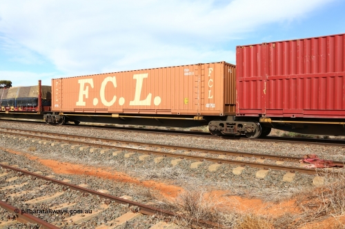 160523 2968
Parkeston, 7SP3 intermodal train, RRQY 8519 platform 2 of 5-pack articulated skel waggon set, built by Qiqihar Rollingstock Works, China in 2015, loaded with a 48' FCL container FSGU 488425.
Keywords: RRQY-type;RRQY8519;Qiqihar-Rollingstock-Works-China;