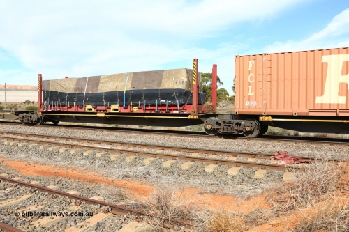 160523 2969
Parkeston, 7SP3 intermodal train, RRQY 8519 platform 3 of 5-pack articulated skel waggon set, built by Qiqihar Rollingstock Works, China in 2015, loaded with a 40' Linfox flatrack FCCU 401042.
Keywords: RRQY-type;RRQY8519;Qiqihar-Rollingstock-Works-China;