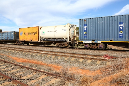 160523 2975
Parkeston, 7SP3 intermodal train, RRGY 7142 platform 5, RRGY type is a 5-pack articulated skeletal container waggon, one of fifty originally built by AN Rail Islington Workshops in 1996-97 as type RRBY, later rebuilt with 48' intermediate decks and recoded to RRGY. Loaded with a 20' ISO 22T8 type tank for Coregas CGBU 000003[6] with argon and a 20' 22G1 type box for Hapag-Lloyd HLXU 205028[1].
Keywords: RRGY-type;RRGY7142;AN-Islington-WS;RRBY-type;