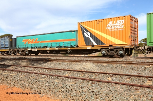 160523 2992
Parkeston, 7SP3 intermodal train, RQGY 34478 63' container waggon, originally built in a batch of one hundred by Tulloch Ltd NSW between 1974 and 75 as an OCY type, recoded to NQOY then NQSY. Loaded with an Allied Pickfords 20' 2NG2 type box KAPU 200431[7] and a 40' Toll half height curtainsider DS 568.
Keywords: RQGY-type;RQGY34478;Tulloch-Ltd-NSW;OCY-type;NQOY-type;NQSY-type;