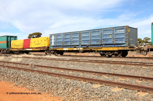 160523 2993
Parkeston, 7SP3 intermodal train, RQEY 1957 2-pack container waggon, originally built by Comeng Qld as the first of forty LEX type louvre waggons in 1966-67, recoded to ALEX, converted to AQEY, recoded to RQEY. Loaded with an SCF half height side door 40' box SCFU 607084[0] and a Simon 40' flatrack FD 131 with a Simon tarped load.
Keywords: RQEY-type;RQEY1957;Comeng-Qld;LEX-type;ALEX-type;AQEY-type;