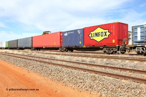 160523 3000
Parkeston, 7SP3 intermodal train, RRGY 7149, the RRGY type is a 5-pack articulated skeletal container waggon, fifty were originally built by AN Rail Islington Workshops in 1996-97 as type RRBY, later rebuilt with 48' intermediate decks and recoded to RRGY. Loaded with 48' boxes on the intermediate platforms and two 20' boxes each end. Linfox 20' 2FG9 type box LSBD 9102002 and Cronos 20' 2EG1 type box CXSU 121782[8] on the 40' end platform and MGCU 40' box 801129[9].
Keywords: RRGY-type;RRGY7149;AN-Islington-WS;RRBY-type;