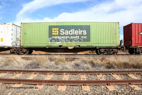 160523 3017
Parkeston, 7SP3 intermodal train, RRAY 7167 platform 5 of 5-pack articulated skeletal waggon set, one of 100 built by ABB Engineering NSW 1996-2000, with a Sadleirs 40' 4FG1 type box RCS 4073.
Keywords: RRAY-type;RRAY7167;ABB-Engineering-NSW;