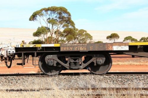 160523 3025
Parkeston, 7SP3 intermodal train, RRKY 2766 container waggon, one of fifty five built by Perry Engineering SA in 1974 as type RMX, recoded to AQMX, AQSY, RQKY. Side view of code board and bogie.
Keywords: RRKY-type;RRKY2766;Perry-Engineering-SA;RMX-type;AQMX-type;AQSY-type;RQKY-type;