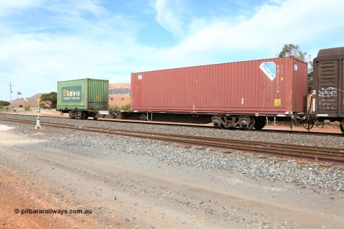 160523 3044
Parkeston, 7SP3 intermodal train, RQJW 22081 jumbo container waggon, one of fifty built in 1975-76 by Mittagong Engineering NSW as JCW type, recoded to NQJW loaded with a CPC 40' 4EG1 type box WPWU 098921 and Sadleirs 20' 2EB0 type box RCSB 5072.
Keywords: RQJW-type;RQJW22081;Mittagong-Engineering-NSW;JCW-type;NQJW-type;