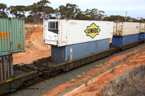 160524 3747
West Kalgoorlie, 2PM6 intermodal train, RRXY 3 platform 2 of 5-pack well waggon set, one of eleven built by Bradken Qld in 2002 for Toll from a Williams-Worley design with a 48' Linfox reefer FTAD 910801 on top of a Royal Wolf 40' box RWVU 400280.
Keywords: RRXY-type;RRXY3;Williams-Worley;Bradken-Rail-Qld;