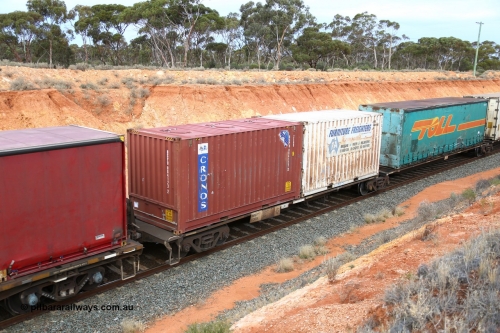 160524 3759
West Kalgoorlie, 2PM6 intermodal train, 40' platform of RRGY 7130 5-pack articulated skel waggon, one of fifty built by AN Rail Islington Workshops in 1996-97 as type RRBY, later rebuilt with 48' intermediate decks and coded RRGY, with two 20' boxes Cronos Bulker BSPD 084123 and Furniture Freighters FFA 12.
Keywords: RRGY-type;RRGY7130;AN-Islington-WS;RRBY-type;