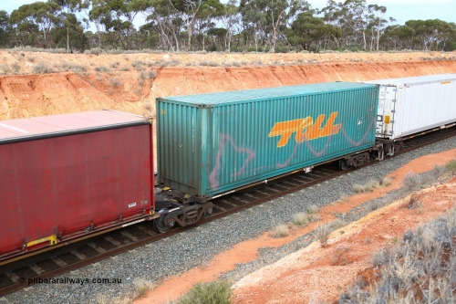 160524 3768
West Kalgoorlie, 2PM6 intermodal train, RRAY 7232 platform 5 of 5-pack articulated skel waggon set, one of 100 built by ABB Engineering NSW 1996-2000, with a 40' Toll box TRRC 410623.
Keywords: RRAY-type;RRAY7232;ABB-Engineering-NSW;