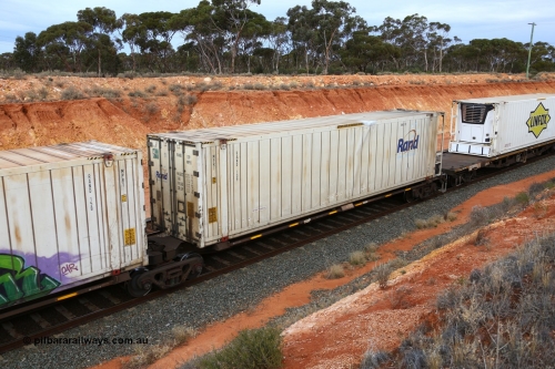 160524 3773
West Kalgoorlie, 2PM6 intermodal train, RQQY 7076 platform 1 of 5-pack articulated skeletal waggon set, 1 of 17 built by Qld Rail at Ipswich Workshops in 1995, 46' 6