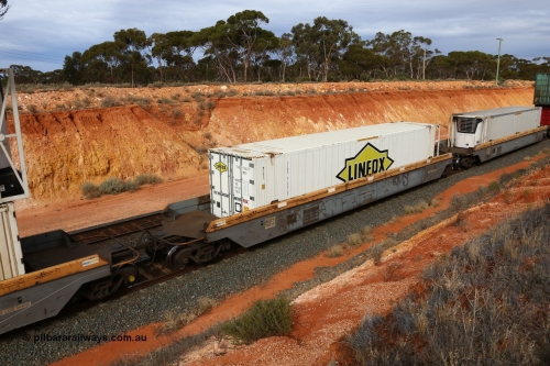 160524 3821
West Kalgoorlie, 2PM6 intermodal train, RQZY 7041 platform 3 of 5-pack well waggon set, one of thirty two sets built by Goninan NSW in 1995-96 for National Rail loaded with a Linfox 48' MFR3 type reefer FCAD 9106107.
Keywords: RQZY-type;RQZY7041;Goninan-NSW;