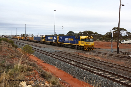 160524 4278
West Kalgoorlie, 1MP2 steel train behind a pair of Goninan built GE model Cv40-9i NR class units NR 66 serial 7250-12/96-268 and NR 32 serial 7250-06/97-234 starts departing the yard for Perth.
Keywords: NR-class;NR66;Goninan;GE;Cv40-9i;7250-12/96-268;