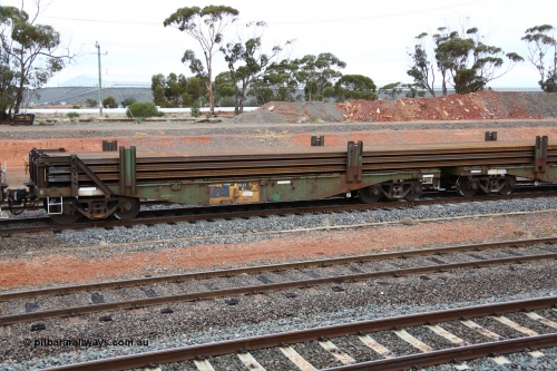 160524 4303
West Kalgoorlie, 1MP2 steel train, RKAX 6, 2-pack rail transport waggon, Platform 1, this waggon was converted by Port Augusta Workshops from two original FBX type waggons built in 1968-69 by Islington Workshops in a batch of twenty later coded AFCX. AKAX 6 and AKCX 14 where the donors for this waggon. Loaded with a full load of rail strings.
Keywords: RKAX-type;RKAX6;SAR-Islington-WS;FBX-type;