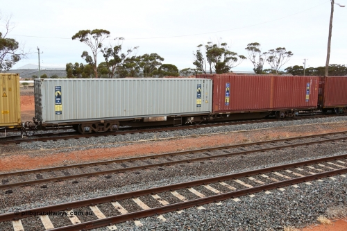 160524 4327
West Kalgoorlie, 1MP2 steel train, RQWW 22007 container waggon, one of thirty two built by Comeng NSW in 1973-75 as JCW type 80' container waggon, recoded to NQTW, then NQWW. These differ from the follow on batches of the JCW type. Loaded with two 40' boxes, Royal Wolf 42G1 type RWTU 431600 and 4EG1 type RWLU 491119.
Keywords: RQWW-type;RQWW22007;Comeng-NSW;JCW-type;NQTW-type;NQWW-type;