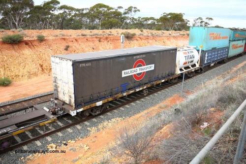 160526 5233
West Kalgoorlie, 4PM6 intermodal train, RRDY 119 container waggon with a 40' Railroad Transport curtainsider RTPC 4002 and a 20' Jamieson built Titan tanktainer. Unsure of the history of these RRDY class waggons, they appear to be SAR Islington built FQX type waggons.
Keywords: RRDY-type;RRDY119;SAR-Islington-WS;FQX-type;