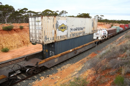 160526 5247
West Kalgoorlie, 4PM6 intermodal train, RQZY 7048 one of thirty two 5-pack well waggon sets built by Goninan in 1995 for National Rail in 1995-96, well contains a 40' RTP 4029 and a Linfox 53' box on top, DRC 448.
Keywords: RQZY-type;RQZY7048;Goninan-NSW;