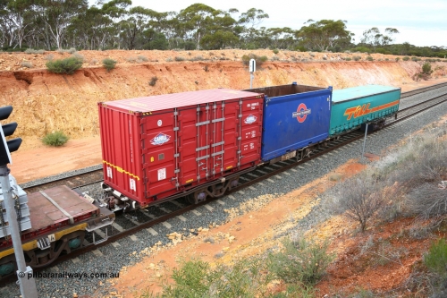 160526 5251
West Kalgoorlie, 4PM6 intermodal train, RQWW 22015 container waggon, one of thirty two built by Comeng NSW in 1973-75 as JCW class, recoded to NQJW with a Cahill 20' side door CHLL 200040, 20' open top Railroad Transport RTP 2011 and a Toll 40' half height curtainsider.
Keywords: RQWW-type;RQWW22015;Comeng-NSW;JCW-type;NQJW-type;