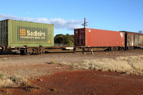 160528 8318
Parkeston, priority service 6PS7, RQJW 22081 container waggon, one of fifty built in 1975-76 by Mittagong Engineering NSW as JCW type, recoded to NQJW, with a Sadleirs 20' 2EB0 type box RCSB 5030 and a CPC 4EG1 type 40' bulker box WPWU 098921[4].
Keywords: RQJW-type;RQJW22081;Mittagong-Engineering-NSW;JCW-type;NQJW-type;