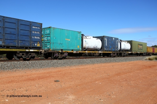 160528 8400
Binduli, intermodal train 6PM6, RQSY 34377 container waggon, built by Goninan NSW in 1974/75 as OCY type, with three 20' boxes, Toll NB 29117 small logo, Direct Logistics tanktainer DLGU 211253 and SCF side door SCFU 306104.
Keywords: RQSY-type;RQSY34377;Goninan-NSW;OCY-type;NQOY-type;