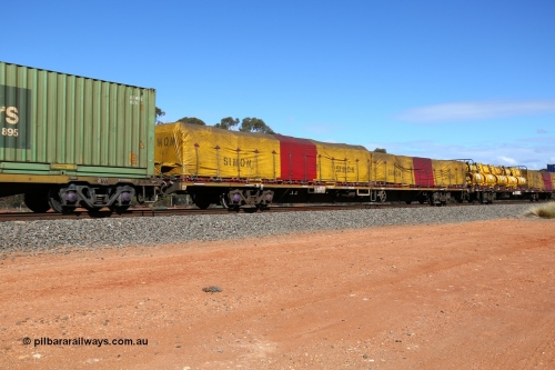 160528 8402
Binduli, intermodal train 6PM6, RQPW 60053 80' jumbo container waggon with two 40' FD flatracks with tarped Simon loads, FD 192. Originally built by Victorian Railways Bendigo Workshops in 1984 as part of fifty VQDW type jumbo container waggons. In the late 80's leased to NSW and recoded to NQMW and renumbered to current number. To National Rail in 1994/95.
Keywords: RQPW-type;RQPW60053;Victorian-Railways-Bendigo-WS;VQDW-type;VQDW30;NQWM-type;