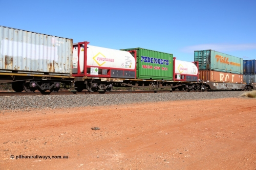 160528 8414
Binduli, intermodal train 6PM6, RQKY type container waggon RQKY 2777, originally built by Perry Engineering SA in 1974 as RMX type in a batch of fifty five waggons. Recoded to AQMX then AQSY in 1988, then to RQKY in 1994. Loaded with two Eurotainer 20' 22T8 type ISO tank tainers EURU 920002 and 920001 with carbon dioxide and a 20' 2EG1 type container Pedemonts PHR 689.
Keywords: RQKY-type;RQKY2777;Perry-Engineering-SA;RMX-type;AQMX-type;AQSY-type;
