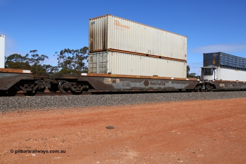 160528 8419
Binduli, intermodal train 6PM6, RRZY type five unit bar coupled well container waggon set RRZY 7016 platform 5, originally built by Goninan in a batch of twenty six RQZY type for National Rail, recoded when repaired. 40' 4FG1 type Austrans container AUCU 412419 double stacked with SCF Rail Containers 40' 4EG1 type container SCFU 410236.
Keywords: RRZY-type;RRZY7016;Goninan-NSW;RQZY-type;