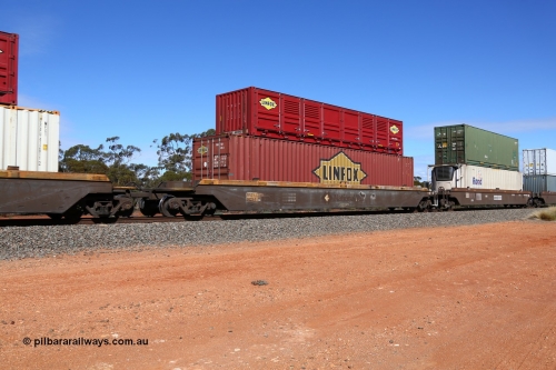 160528 8447
Binduli, intermodal train 6PM6, RRZY type five unit bar coupled well container waggon set RRZY 7023 platform 1, originally built by Goninan in a batch of twenty six RQZY type for National Rail, recoded when repaired. Loaded with a Linfox 48' MFG1 type container DRC 501 double stacked with a Linfox 40' half height side door container LSDU 6940033.
Keywords: RRZY-type;RRZY7023;Goninan-NSW;RQZY-type;
