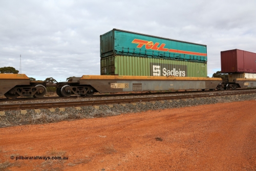 160529 8771
Parkeston, 6MP4 intermodal train, RRZY 7049 platform 4 of 5-pack well waggon set, one of thirty two sets built by Goninan NSW in 1995-96 for National Rail as RQZY type, recoded to RRZY when repaired with a Sadleirs 40' box RCS 4011 and Toll 40' half height curtainsider 5TC 501.
Keywords: RRZY-type;RRZY7049;Goninan-NSW;RQZY-type;