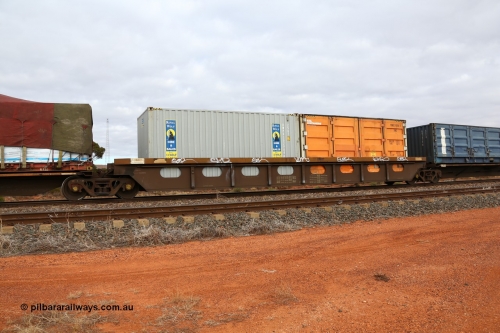 160529 8783
Parkeston, 6MP4 intermodal train, RQLY 1007 an articulated five unit container waggon with centre well, one of a batch of fourteen built by AN Rail Islington Workshops in 1991 as AQLY type, platform 3 centre well loaded with a Rail Containers 20' 2NG2 type side door container TSBD 310056[1] and a Royal Wolf 20' 25G1 type box RWPU 302904[0].
Keywords: RQLY-type;RQLY1007;AN-Islington-WS;AQLY-type;