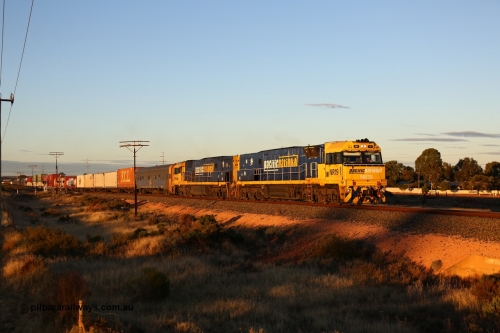 160601 10088
West Kalgoorlie, 2MP5 intermodal service climbs up the grade from Kalgoorlie across Gateacre Road at the 651 km post behind Goninan built GE model Cv40-9i NR class unit NR 19 serial 7250-03/97-221 and a sister unit and 24 waggons for 1464 metres and 3936 tonnes.
Keywords: NR-class;NR19;Goninan;GE;Cv40-9i;7250-03/97-221;