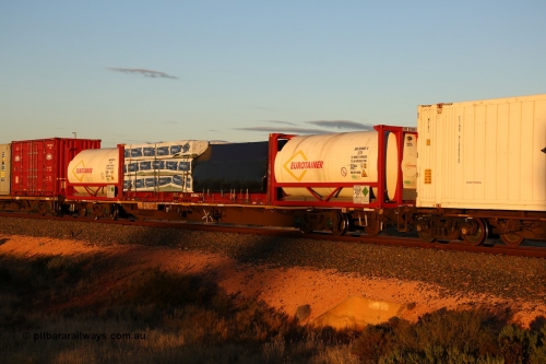 160601 10093
West Kalgoorlie, 2MP5 intermodal train, RQJW 21964, jumbo container waggon, one of twenty five built by Mittagong Engineering NSW as NQJW type in 1980-81. Eurotainer 20' 22T8 ISO tank EURU 920001[5], 40' flatrack FCCU 401075 with timber products and Eurotainer 20' 22T8 ISO tank EURU 920002[0].
Keywords: RQJW-type;RQJW21964;Mittagong-Engineering-NSW;NQJW-type;