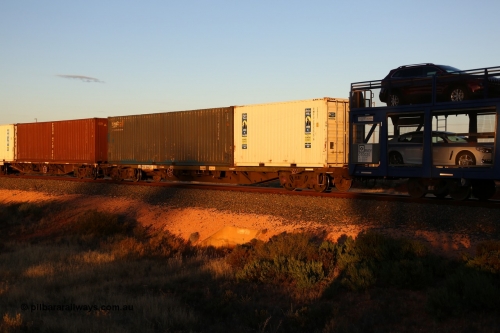 160601 10099
West Kalgoorlie, 2MP5 intermodal train, RQGY 34425, one of a hundred built by Tulloch Ltd NSW as OCY type in 1974/75, recoded to NQOY, then modified to NQGY. Loaded with Royal Wolf 20' 25G1 type box RWPU 202275[6] and sea2rail 40' 4EG1 type box AUSU 407168[4].
Keywords: RQGY-type;RQGY34425;Tulloch-Ltd-NSW;OCY-type;NQOY-type;NQGY-type;