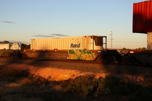 160601 10115
West Kalgoorlie, 2MP5 intermodal train, RQZY 7065 platform 1 of 5-pack well waggon set one of thirty two waggon sets built by Goninan NSW for National Rail in 1995-96, with Rand Refrigerated Logistics 46' 6