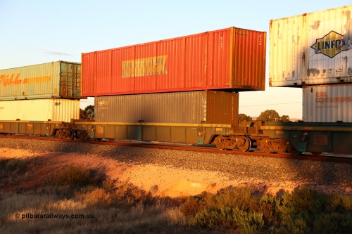 160601 10119
West Kalgoorlie, 2MP5 intermodal train, RRXY 9 platform 4 of 5-pack well waggon set, one of eleven built by Bradken Qld in 2002 for Toll from a Williams-Worley design with a 40' 4EG1 type sea2rail Austrans box AUSU 407179[2] in the well and a 53' Patrick automobile box A 140 on top.
Keywords: RRXY-type;RRXY9;Williams-Worley;Bradken-Rail-Qld;