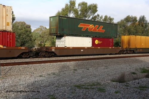 160609 0420
Woodbridge, 5PM5 intermodal train, platform 5 of 5-pack RRRY 7008 well waggon set, one of nineteen built in China at Zhuzhou Rolling Stock Works for Goninan in 2005, two 20' boxes Royal Wolf RWTU and CARU Specialized Leasing SLZU 720079 with a 48' curtainsider ISCU 4891025 on top.
Keywords: RRRY-type;RRRY7008;CSR-Zhuzhou-Rolling-Stock-Works-China;