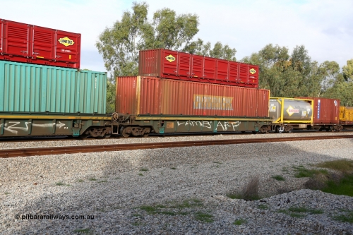 160609 0425
Woodbridge, 5PM5 intermodal train, RRXY 9 platform 1 of 5-pack well waggon set, one of eleven built by Bradken Qld in 2002 for Toll from a Williams-Worley design with a 53' Patrick automobile box A 066 and a 40' Linfox half height side door unit LSDU 694000 on top.
Keywords: RRXY-type;RRXY9;Williams-Worley;Bradken-Rail-Qld;