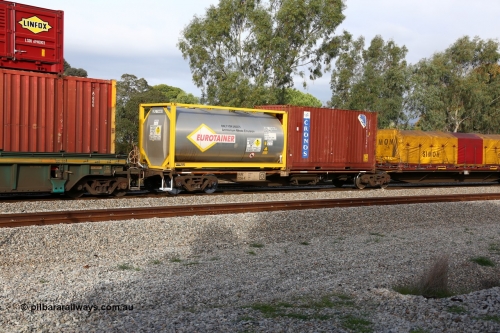160609 0426
Woodbridge, 5PM5 intermodal train, RRAY 7256 platform 5 of 5-pack articulated skel waggon set, one of 100 built by ABB Engineering NSW 1996-2000, with Eurotainer 20' 22K2 type tank EURU 114494[9] and a Cronos 20' 2EG1 type box CRXU 077158[3].
Keywords: RRAY-type;RRAY7256;ABB-Engineering-NSW;
