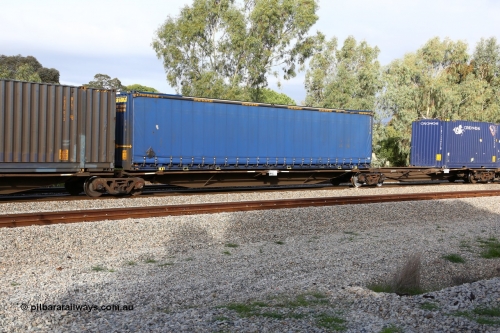 160609 0429
Woodbridge, 5PM5 intermodal train, RRAY 7256 platform 2 of 5-pack articulated skel waggon set, one of 100 built by ABB Engineering NSW 1996-2000, with Pacific National 48' MFG4 type curtainsider PNXC 5679.
Keywords: RRAY-type;RRAY7256;ABB-Engineering-NSW;